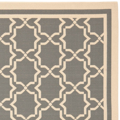 Tapis de jardin imperméable d'intérieur/extérieur SAFAVIEH Courtyard Thomasina