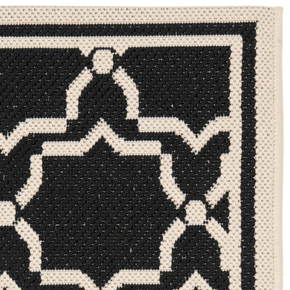 Tapis de jardin imperméable d'intérieur/extérieur SAFAVIEH Courtyard Thomasina