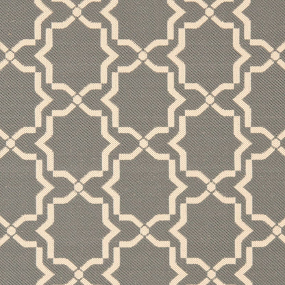 Tapis de jardin imperméable d'intérieur/extérieur SAFAVIEH Courtyard Thomasina