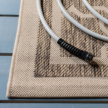 Tapis de jardin imperméable d'intérieur/extérieur SAFAVIEH Courtyard Thomasina