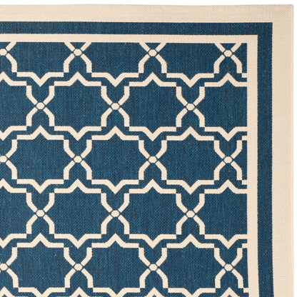 Tapis de jardin imperméable d'intérieur/extérieur SAFAVIEH Courtyard Thomasina