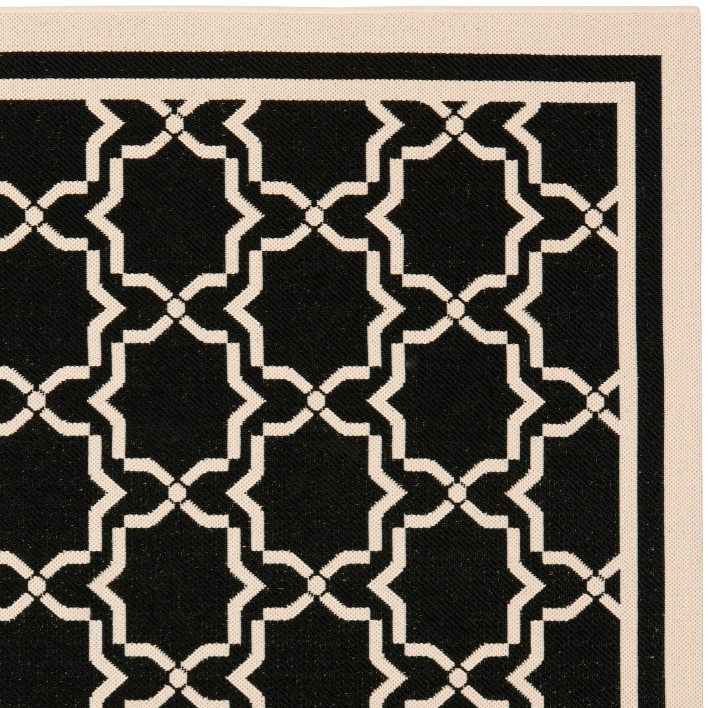 Tapis de jardin imperméable d'intérieur/extérieur SAFAVIEH Courtyard Thomasina