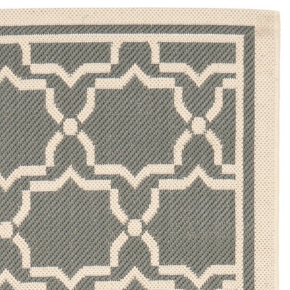 Tapis de jardin imperméable d'intérieur/extérieur SAFAVIEH Courtyard Thomasina