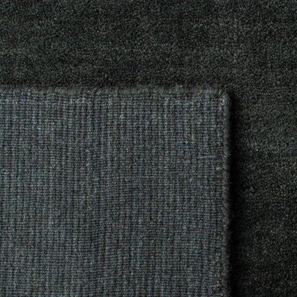 Tapis moderne en laine fait main SAFAVIEH avec bordure en palmier de l'Himalaya