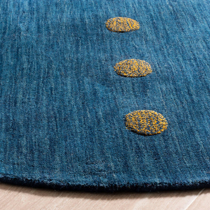 Tapis moderne en laine fait main SAFAVIEH Himalaya Poppy Glossary