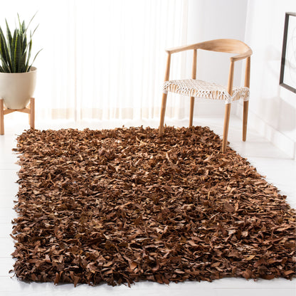 Tapis décoratif moderne en cuir fait main SAFAVIEH Shag Doinita