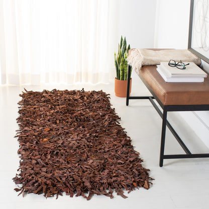 Tapis décoratif moderne en cuir fait main SAFAVIEH Shag Doinita