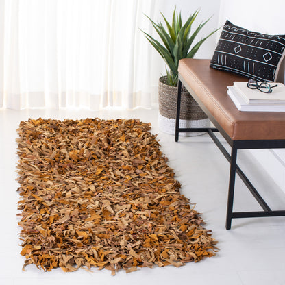 Tapis décoratif moderne en cuir fait main SAFAVIEH Shag Doinita