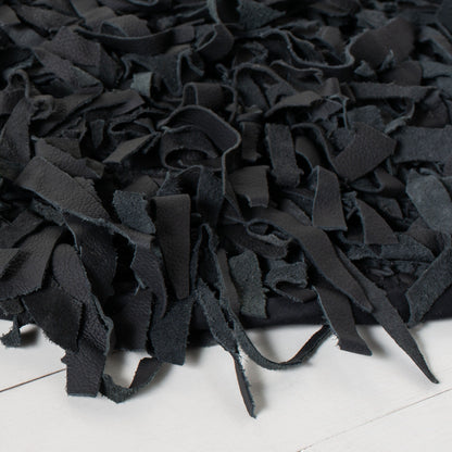 Tapis décoratif moderne en cuir fait main SAFAVIEH Shag Doinita