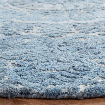 SAFAVIEH Tapis en laine à médaillon moderne Carlijn fait à la main