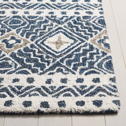 Tapis en laine Lutetia micro-bouclé fait main SAFAVIEH