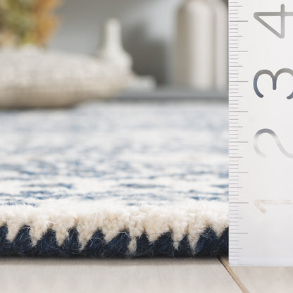 Tapis en laine Lutetia micro-bouclé fait main SAFAVIEH