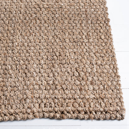 Tapis en jute Dorkas fait main en fibres naturelles SAFAVIEH