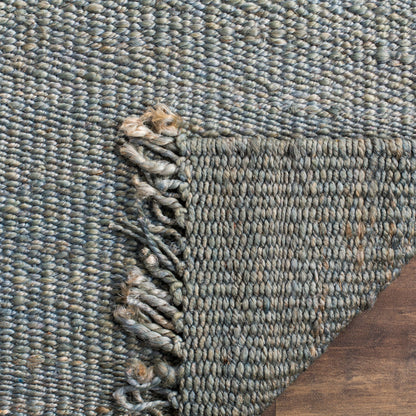 Tapis à franges en jute Eybjorg fait main en fibres naturelles SAFAVIEH