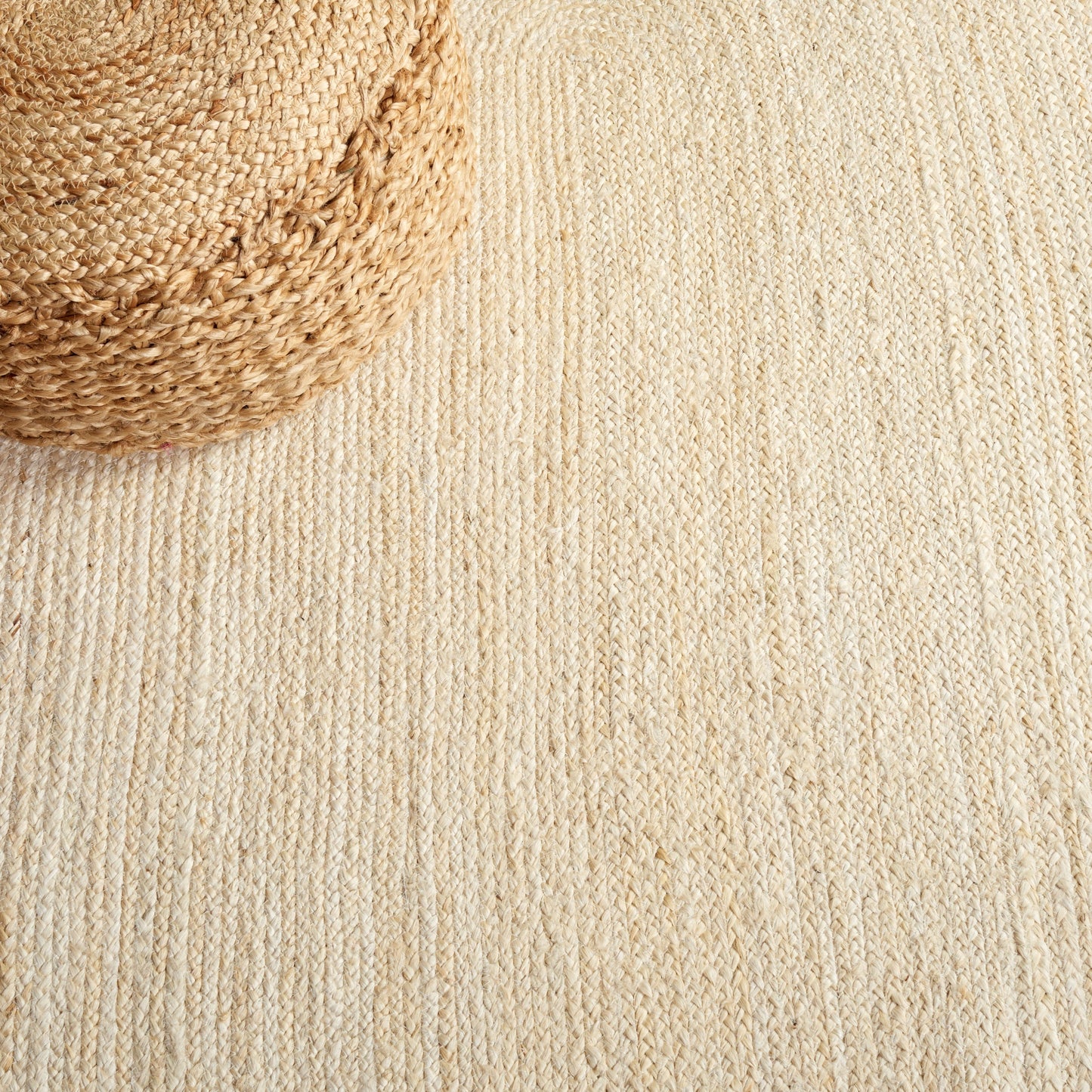 Tapis rond en jute fait main en fibres naturelles Jolette avec bordure SAFAVIEH