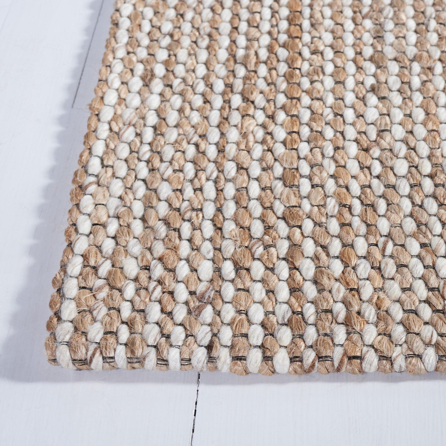 Tapis fait main en fibre naturelle Yareli en jute et laine SAFAVIEH.
