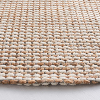 Tapis fait main en fibre naturelle Yareli en jute et laine SAFAVIEH.