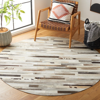 Tapis en cuir moderne Tennille fait main SAFAVIEH