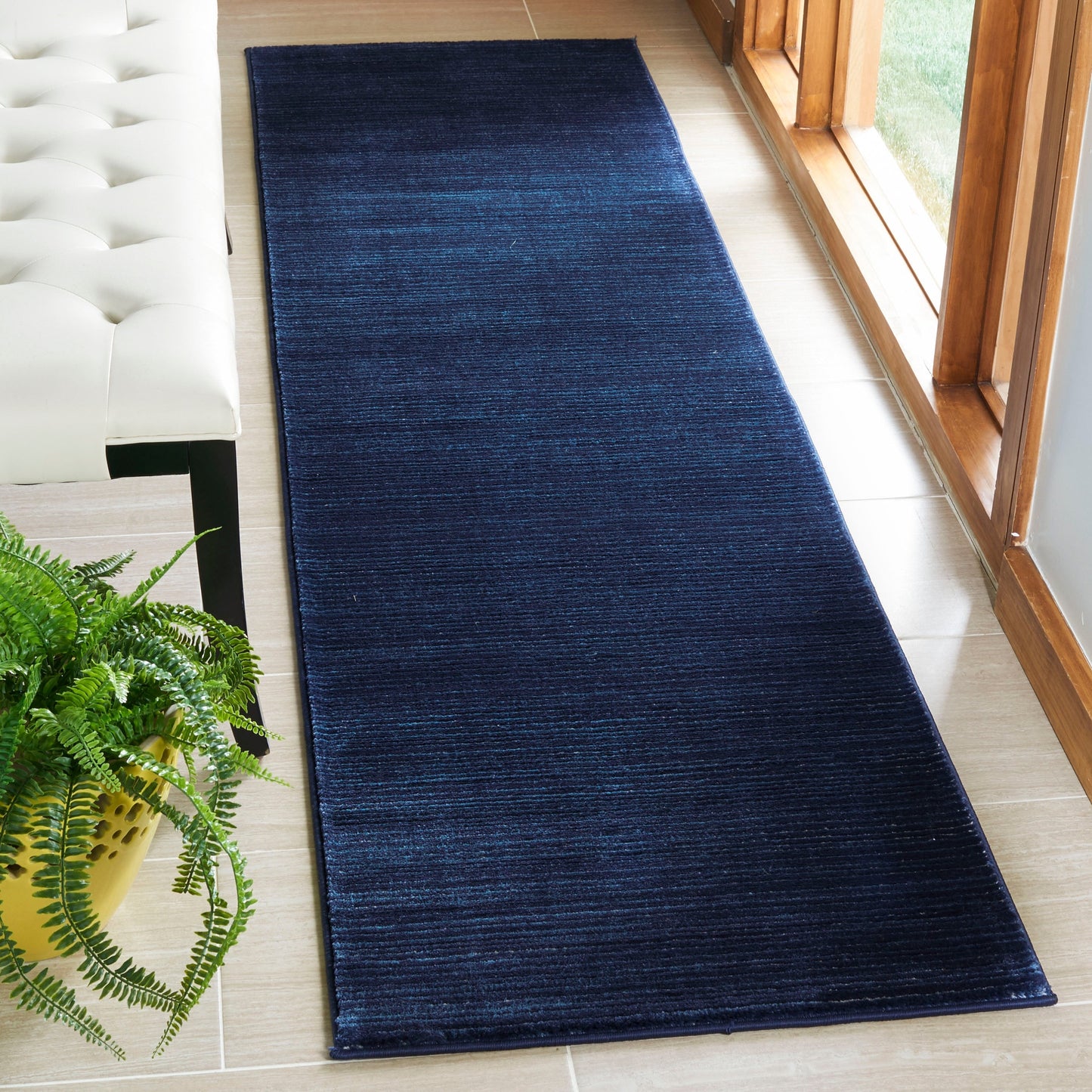 Tapis moderne SAFAVIEH Vision Sunanda aux tons ombrés.