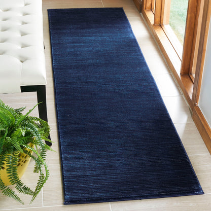 Tapis moderne SAFAVIEH Vision Sunanda aux tons ombrés.