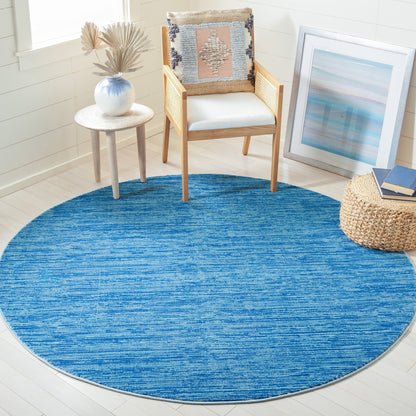 Tapis moderne SAFAVIEH Vision Sunanda aux tons ombrés.
