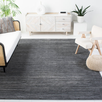 Tapis moderne SAFAVIEH Vision Sunanda aux tons ombrés.