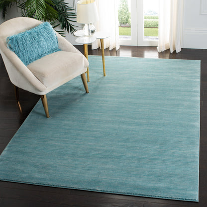 Tapis moderne SAFAVIEH Vision Sunanda aux tons ombrés.