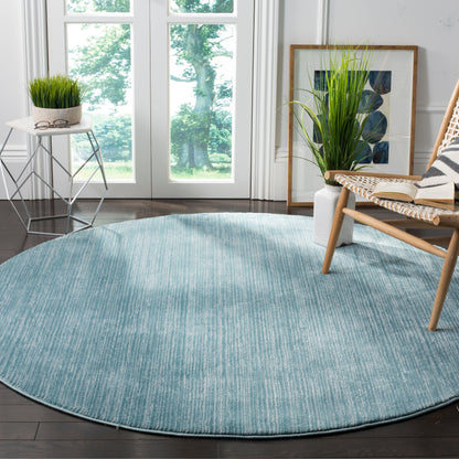 Tapis moderne SAFAVIEH Vision Sunanda aux tons ombrés.