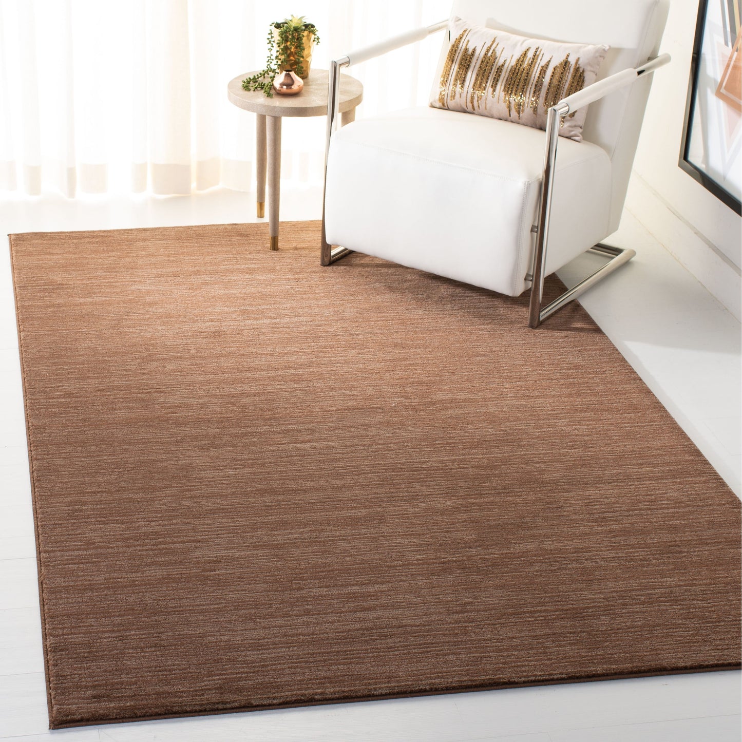 Tapis moderne SAFAVIEH Vision Sunanda aux tons ombrés.