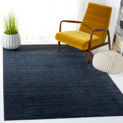Tapis moderne SAFAVIEH Vision Sunanda aux tons ombrés.