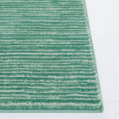 Tapis moderne SAFAVIEH Vision Sunanda aux tons ombrés.