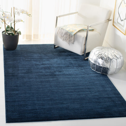Tapis moderne SAFAVIEH Vision Sunanda aux tons ombrés.