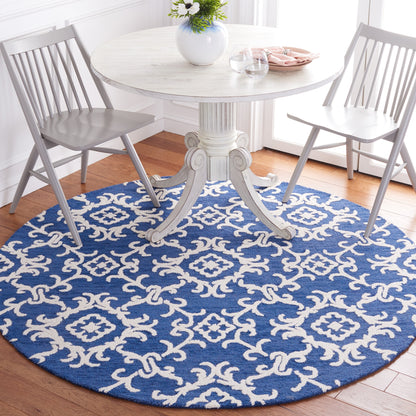 SAFAVIEH, Tapis en laine floral moderne Vesela fait main