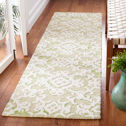 SAFAVIEH, Tapis en laine floral moderne Vesela fait main