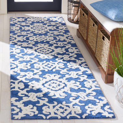 SAFAVIEH, Tapis en laine floral moderne Vesela fait main