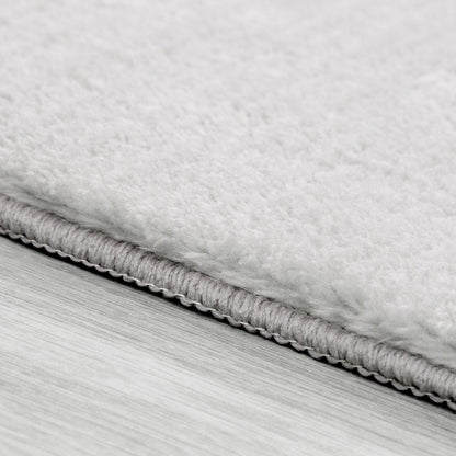 Tapis doux et lavable avec envers antidérapant, couleurs unies