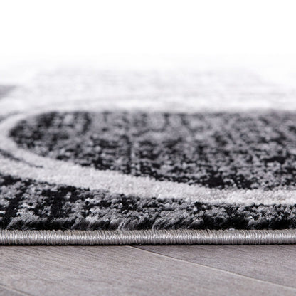 Tapis circulaire abstrait en polypropylène fabriqué à la machine, de la World Rug Gallery